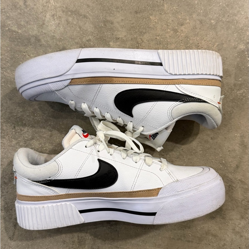 Nike White Sneakers with Black Swoosh and Tan Accent